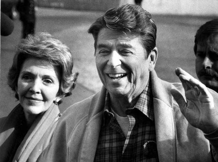 Former U.S president Ronald Reagan is seen with his wife, former First Lady Nancy Reagan, in this February 15, 1982 file photo as they returned to the White House after spending a weekend [at Camp David.] Reuters