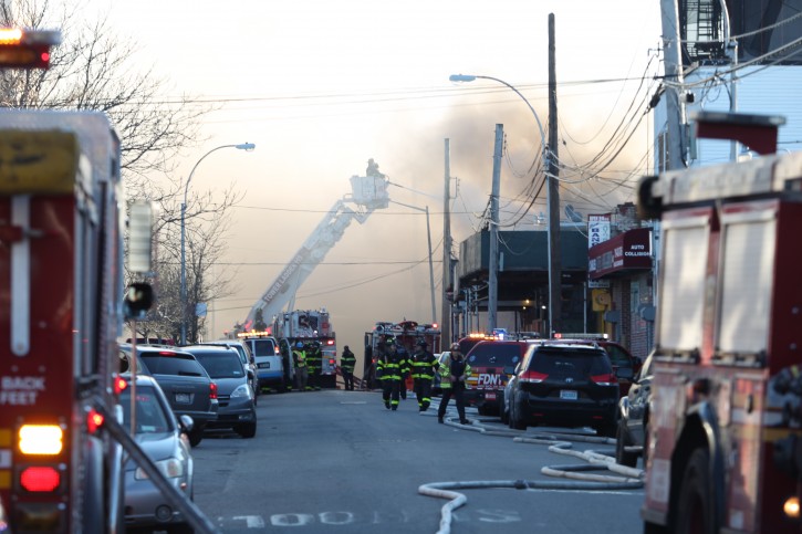 Smoke billowed into the sky during the 5th Alarm Queens fire. Credits: Roy Renna