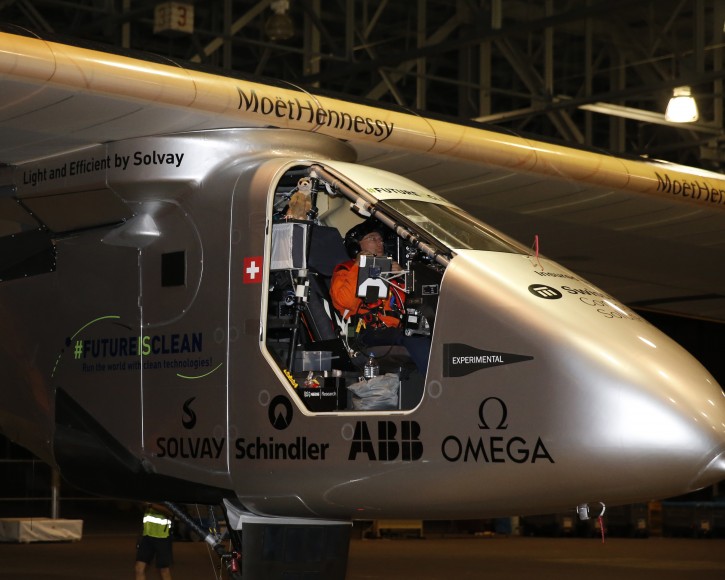Solar Impulse 2 pilot Bertrand Piccard prepares to fly across the Pacific in a solar plane from Kalaeloa Airport, Thursday, April 21, 2016, in Kapolei, Hawaii. The solar plane will fly a two-and-a-half day journey to Northern California. (AP Photo/Marco Garcia)