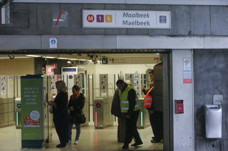 Passengers at the Maelbeek - Maalbeek metro station, during its reopening one month after it was closed due to the terrorist attacks, in Brussels, Belgium, 25 April 2016. EPA