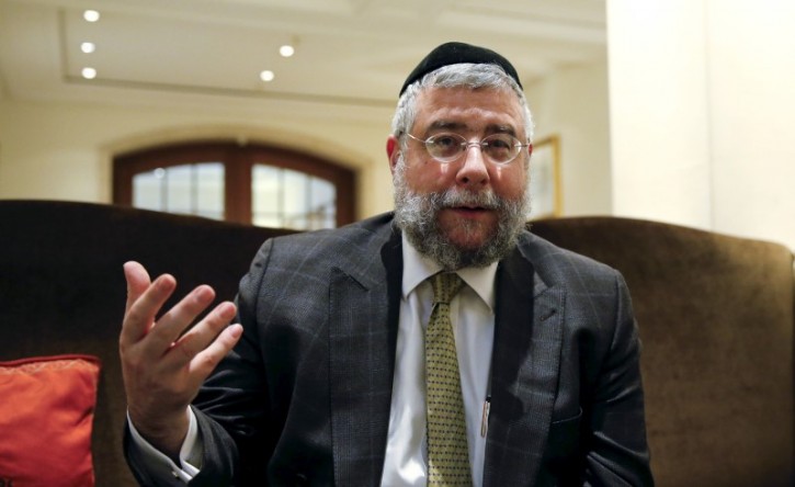 FILE - Chief Rabbi of Russia and President of the Conference of European Rabbis Pinchas Goldschmidt gestures during an interview with Reuters in a hotel in Berlin, Germany, February 24, 2016.REUTERS/Fabrizio Bensch