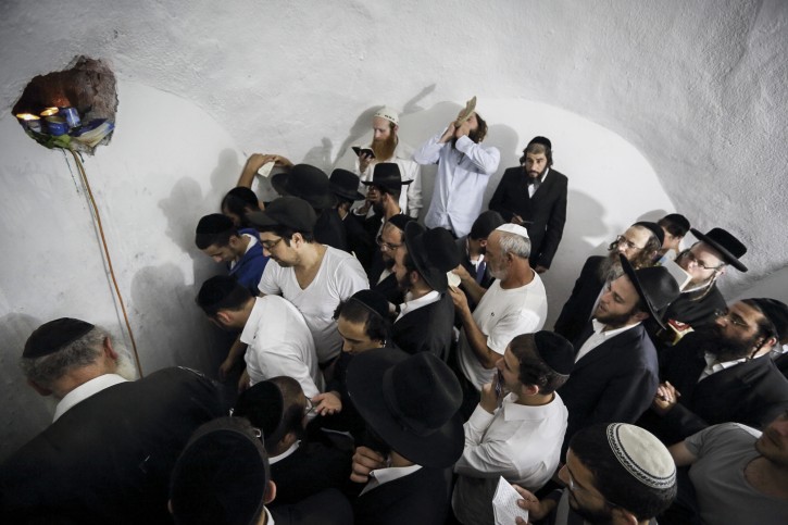 Thousands of Ultra Orthodox Jewish men entered the Palestinian village of Kif al Harat, in the West Bank, accompanied by Israeli soldiers, to pray at the tombs of Yehoshua Ben Nun and Kaleb Ben Yepune, on May 3, 2016. Photo by yaakov Naumi/Flash90. 