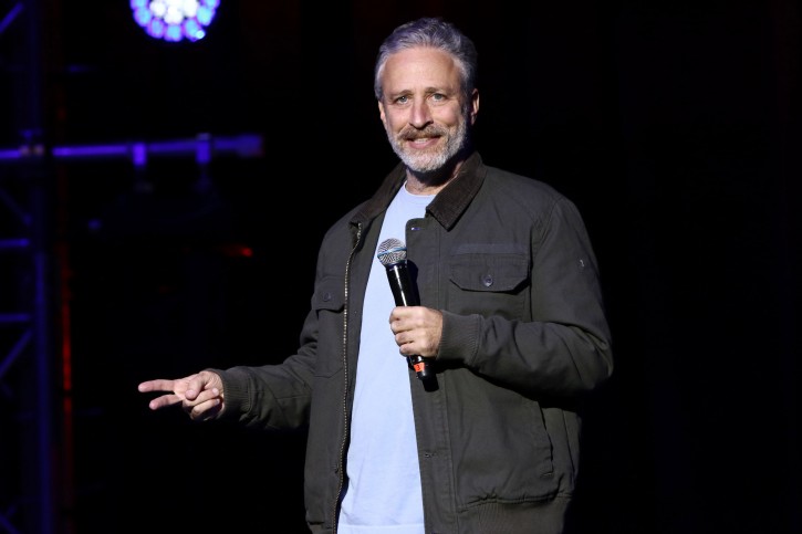 FILE - In this Tuesday, Nov. 10, 2015, file photo, comedian Jon Stewart performs at the 9th Annual Stand Up For Heroes event, in New York. During a taping of a podcast with President Barack Obama's former aide on Monday, May 9, 2016, Stewart described presumptive Republican presidential nominee Donald Trump as a "man-baby."(Photo by Greg Allen/Invision/AP, File)