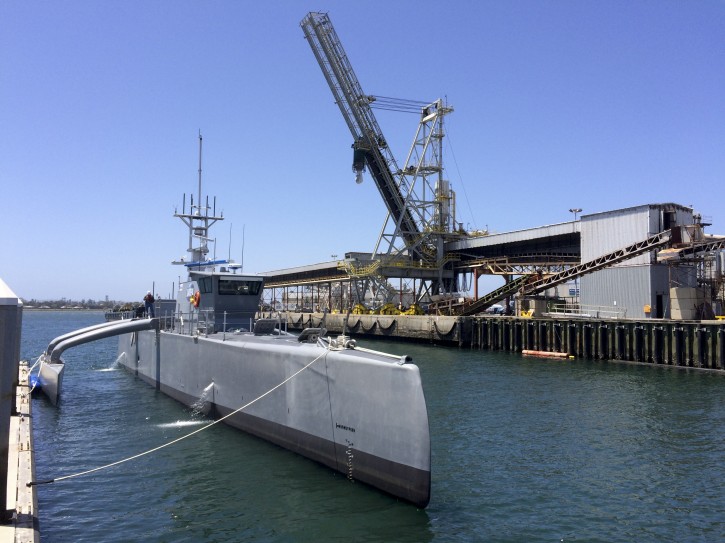 A self-driving, 132-foot military ship sits at a maritime terminal Monday, May 2, 2016, in San Diego. The Pentagon's research arm is launching tests on the world's largest unmanned surface vessel designed to travel thousands of miles out at sea without a single crew member on board. (AP Photo/Julie Watson)
