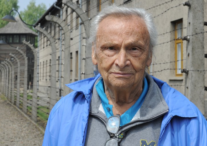 Sam Peltz, 83, a Holocaust survivor from Poland, now living in the U.S., stops for a photo prior to the yearly March of the Living, in the former German Nazi Death camp Auschwitz-Birkenau, in Oswiecim, Poland, Thursday, May 5, 2016. (AP Photo/Alik Keplicz)