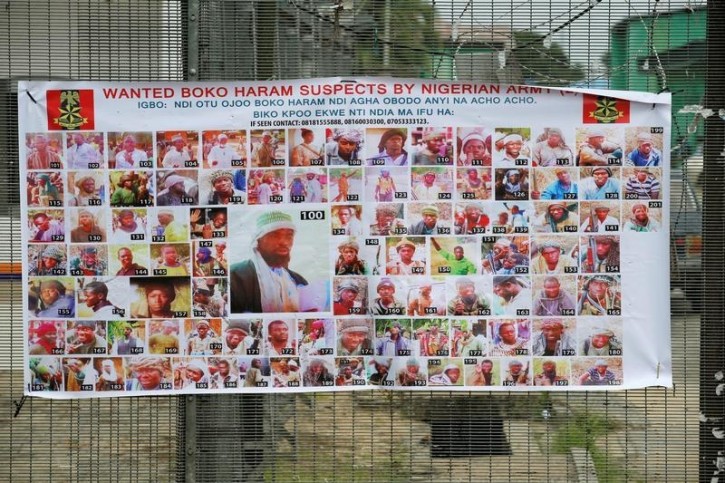 A poster displaying wanted Boko Haram suspects is seen on a street in Yenagoa in Nigeria's delta region May 19, 2016. REUTERS/Akintunde Akinleye 