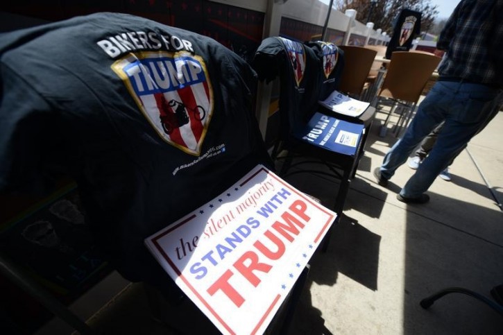 Organizers offer merchandise for sale during a Bikers for Trump 2016 rally at Jergels Rhythm Grille in Warrendale, Pennsylvania April 24, 2016. REUTERS/Alan Freed/File Photo