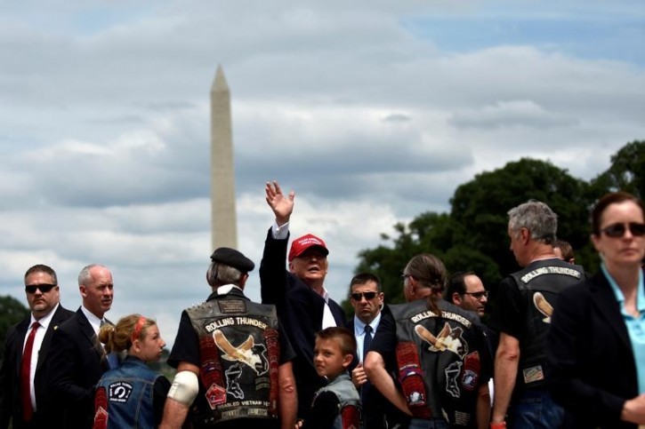 Republican U.S. presidential candidate Donald Trump addresses motorcyclists participating in Rolling Thunder, the annual ride around Washington Mall to raise awareness for prisoners of war and soldiers still missing in action, in Washington, U.S., May 29, 2016. REUTERS/James Lawler Duggan