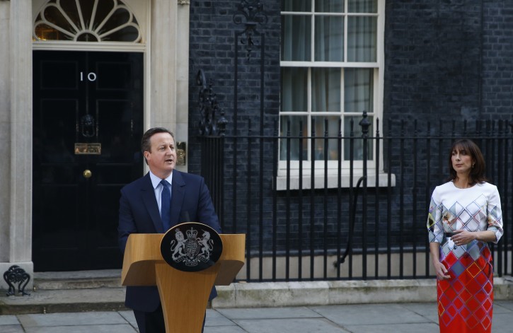 Britain's Prime Minister David Cameron, accompanied by his wife, Samantha, speaks to the media in front of 10 Downing street, London, Friday, June, 24, 2016, as he announces he will resign by the time of the Conservative Party conference in the autumn, following the result of the EU referendum, in which the Britain voted to leave the EU. (AP Photo/Alastair Grant)