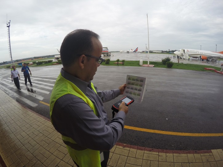 In this Thursday, June 9, 2016, photo, Galo Beltran, Cuba country manager for American Airlines, tests a handheld baggage scanner at Havana’s Jose Marti International Airport. Beltran is based in Dallas. The Department of Transportation said Friday that six airlines: American, Frontier, JetBlue, Silver Airways, Southwest and Sun Country, have been selected for routes to nine Cuban cities other than Havana. (AP Photo/Scott Mayerowitz)