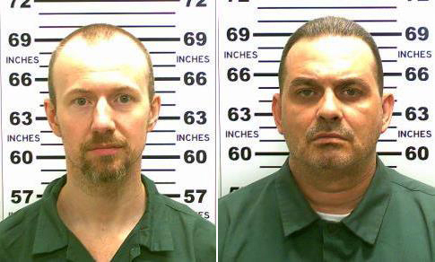 FILE - At left, in a May 21, 2015, file photo released by the New York State Police is David Sweat. At right, in a May 20, 2015, file photo released by the New York State Police is Richard Matt. An investigation into the escape of the two murderers from the northern New York prison last year concludes chronic staff complacency, complicit employees and failures of basic security procedures were to blame. (New York State Police via AP, File)
