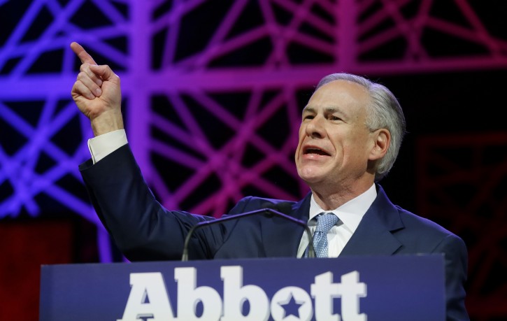 FILE - In this May 12, 2016, file photo, Texas Gov. Greg Abbott speaks during the opening of the Texas Republican Convention in Dallas. Emails from 2010 show that the staff of then-Texas Attorney General Greg Abbott investigating Trump University thought the real estate seminars were a scam bilking "novices" with get-rich-quick promises that were impossible to deliver. (AP Photo/LM Otero, File)