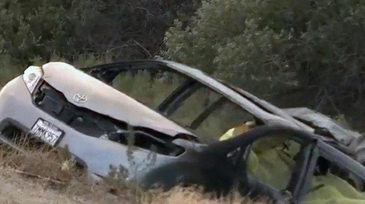 In this image made from video, a minivan burned on the side of Interstate 5, near the community of Gorman in Tejon Pass, about 65 miles north of downtown Los Angeles Tuesday, June 28, 2016. A fiery minivan wreck killed two mothers and their four children on a highway in northern Los Angeles County. The minivan got in a minor collision and stopped on the shoulder. It was still partially in a lane when a semitrailer hit it and it burst into flames with the women and children inside. KABC-7 via AP)