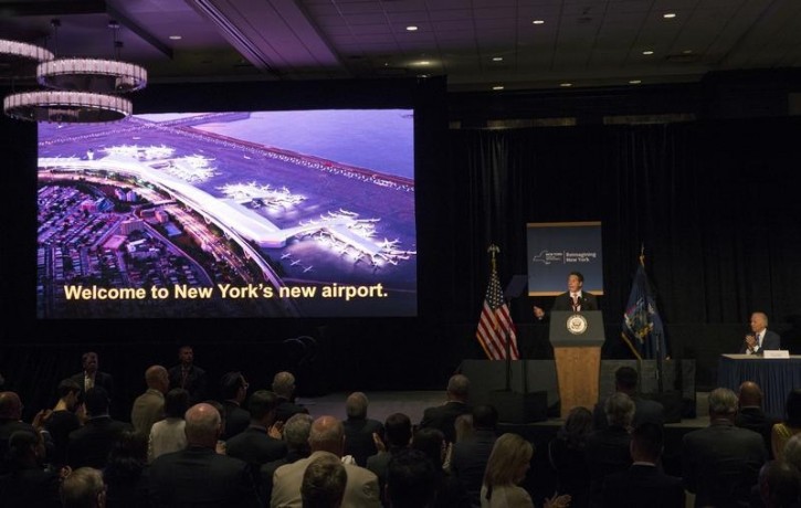 FILE - New York Governor Andrew Cuomo speaks as U.S. Vice President Joe Biden (R) looks on at an event to announce a major reconstruction project of New York's LaGuardia Airport in New York City, July 27, 2015.   REUTERS/Mike Segar 