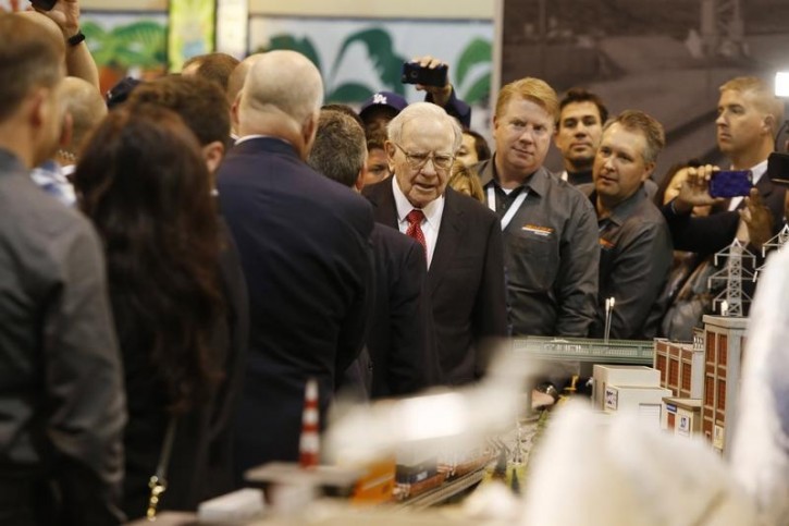 FILE - Warren Buffett stops at the BNSF Railway booth in the exhibit hall during the Berkshire Hathaway Annual Shareholders Meeting at the CenturyLink Center in Omaha, Nebraska, U.S. April 30, 2016. REUTERS/Ryan Henriksen 