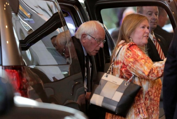 Democratic U.S. presidential candidate Bernie Sanders and his wife Jane O'Meara Sanders arrive for a meeting with Democratic U.S. presidential candidate Hillary Clinton at a hotel in Washington, U.S., June 14, 2016.      REUTERS/Joshua Roberts