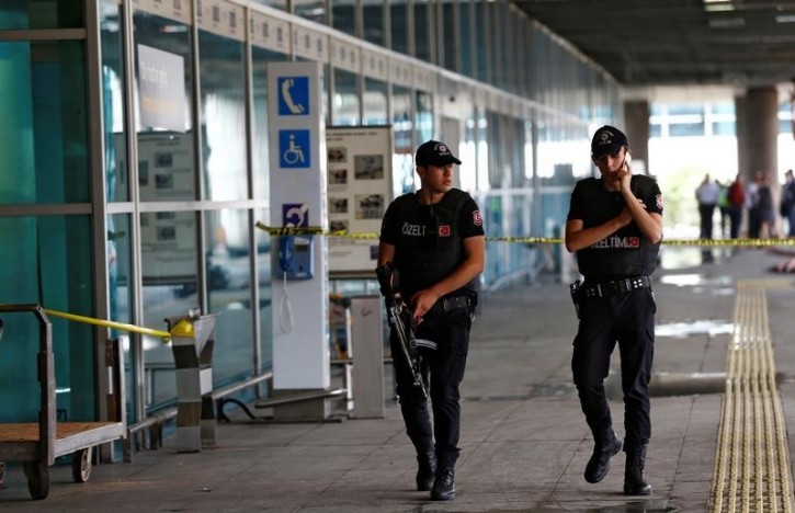 Police officers patrol at Turkey's largest airport, Istanbul Ataturk, following yesterday's blast June 29, 2016. REUTERS/Osman Orsal 