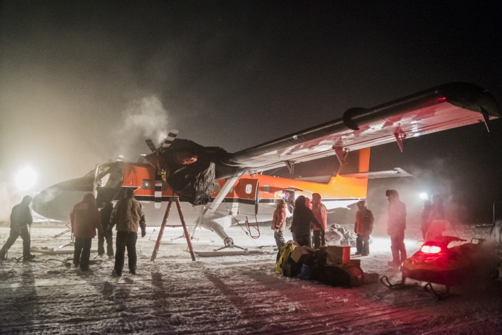 In this photo provided by the National Science Foundation, a small plane picks up a sick worker at the U.S. South Pole science station. Once the sick patient and the crew rest, they will then fly off Antarctica for medical attention that could not be provided on the remote continent. (Robert Schwarz/NSF via AP)