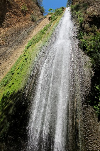 This May 29, 2016 photo shows the Oven Fall, a waterfall on a trail in the Nahal Iyyon Nature Reserve in Metulla, Israel's most northerly point. Metulla has a long history as a frontier town engulfed on three sides by Lebanon, but the nature reserve is a scenic and peaceful place. (AP Photo/Aron Heller)