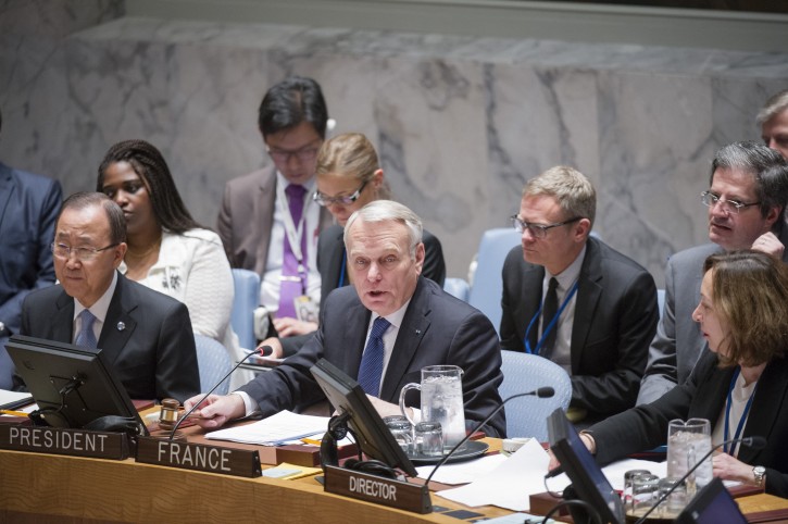 In this photo provided by the United Nations, Jean-Marc Ayrault, center, Minister for Foreign Affairs and International Development of France, addresses the United Nations Security Council, Friday, June 10, 2016 at United Nations headquarters. U.N. Secretary-General Ban Ki-moon is seated to his left and Hasmik Egian, Acting Director of the Security Council Affairs Division, is to the right. Ayrault addressed a small group of reporters on Friday, warning that Israel's ban on Palestinians entering its territory following the "abominable" attack on a popular cafe in Tel Aviv could escalate violence instead of focus attention on the need to pursue peace. (Rick Bajornas/The United Nations via AP)