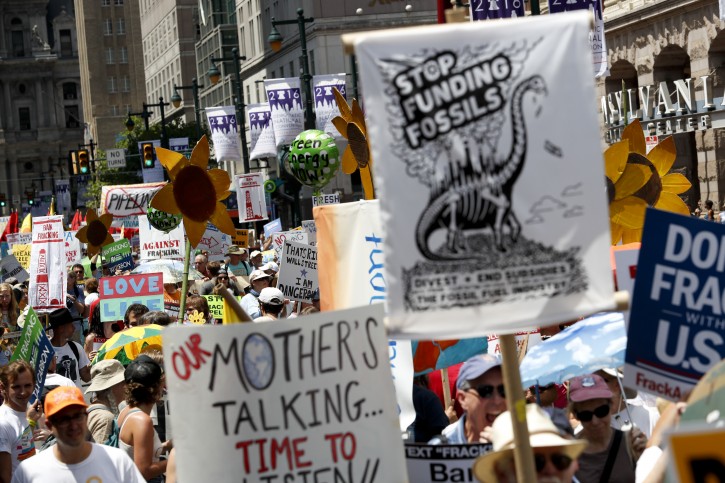 Protesters march during a demonstration in downtown on Sunday, July 24, 2016, in Philadelphia. The Democratic National Convention starts Monday. (AP Photo/Alex Brandon)