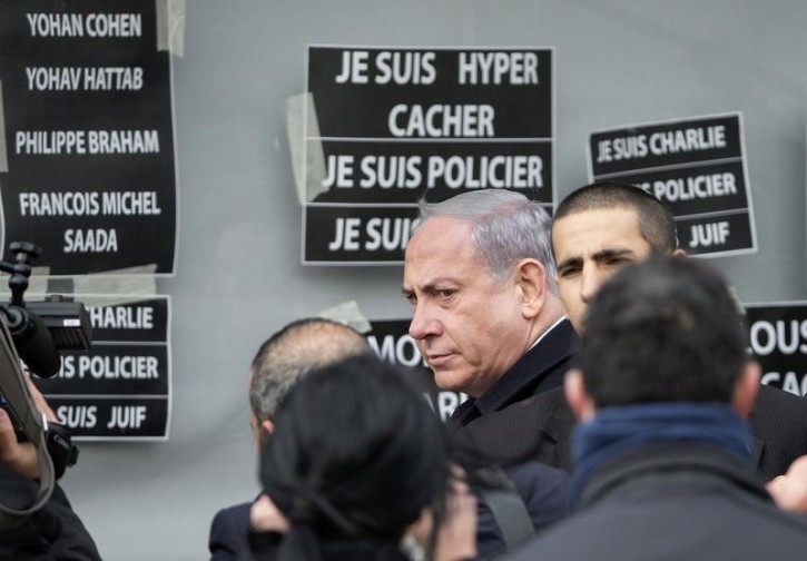 FILE - Israel's Prime Minister Benjamin Netanyahu arrives at the Hyper Cacher kosher supermarket January 12, 2015 near the Porte de Vincennes in Paris, where four hostages were killed. Reuters