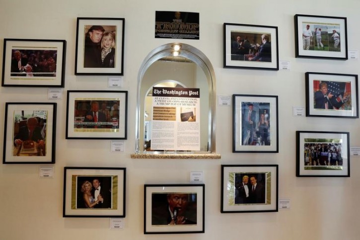 Photographs of different points in Republican U.S. presidential candidate Donald Trump's life are displayed at The Trump Museum near the Republican National Convention in Cleveland, Ohio, U.S., July 19, 2016.  REUTERS/Lucas Jackson 