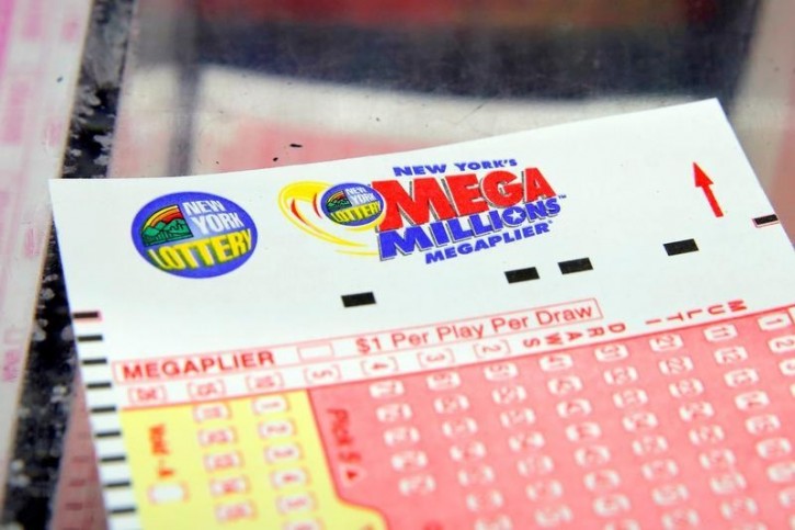 A ticket is seen ahead of the Mega Millions lottery draw in Manhattan, New York, U.S., July 1, 2016.  REUTERS/Andrew Kelly
