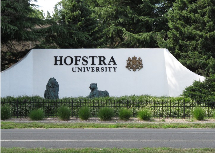 This July 27, 2016 photo shows the entrance to Hofstra University in Hempstead, N.Y. , which is hosting the first presendential debate this fall. Hofstra will be familiar territory to New Yorkers Donald Trump and Hillary Clinton - this will be the third straight election cycle for debates there. It was chosen to pinch-hit as an alternate after Wright State University in Ohio dropped out. (AP Photo/Frank Eltman)