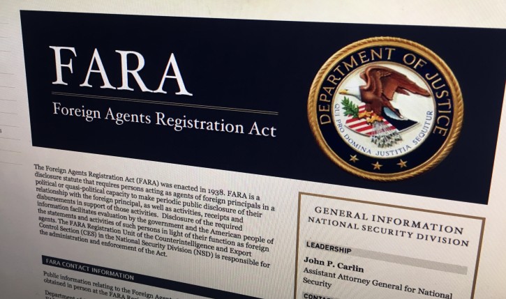 A portion of the website for the website fara.gov, on the Foreign Agents Registration Act, is photographed in Washington, Thursday, Aug. 18, 2016. A firm run by Donald Trump's campaign chairman directly orchestrated a covert Washington lobbying operation on behalf of Ukraine's ruling political party, attempting to sway American public opinion in favor of the country's pro-Russian government, emails obtained by The Associated Press show. Paul Manafort and his deputy, Rick Gates, never disclosed their work as foreign agents as required under federal law. (AP Photo/Jon Elswick)
