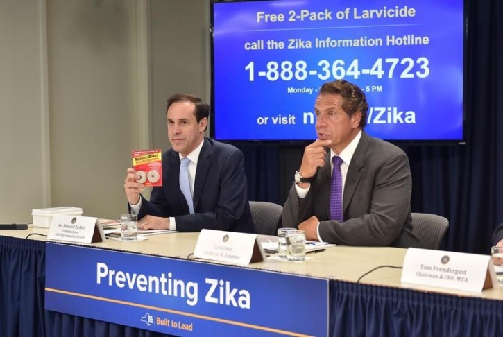 Governor Andrew M. Cuomo, joined by Dr. Howard Zucker, the Commissioner of the New York State Department of Health speaks during the rollout of a Zika Information hotline and website, in New York, NY, U.S., August 2, 2016. Picture taken August 2, 2016. Kevin P. Coughlin/Office of the Governor/Handout via REUTERS 