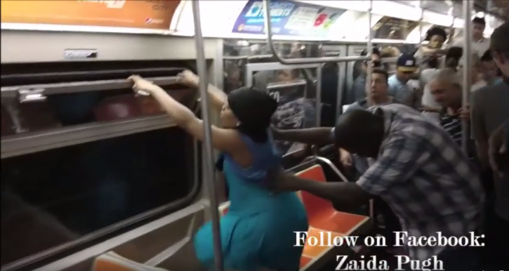 Zaida Pugh held down by Subway riders after she released the crickets
