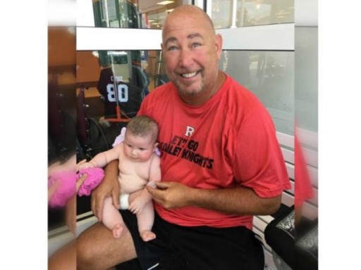 Steve Eckel, a retired officer from the Middlesex County Sheriff’s Office holding teh baby he saved( (Courtesy of Steve Eckel))