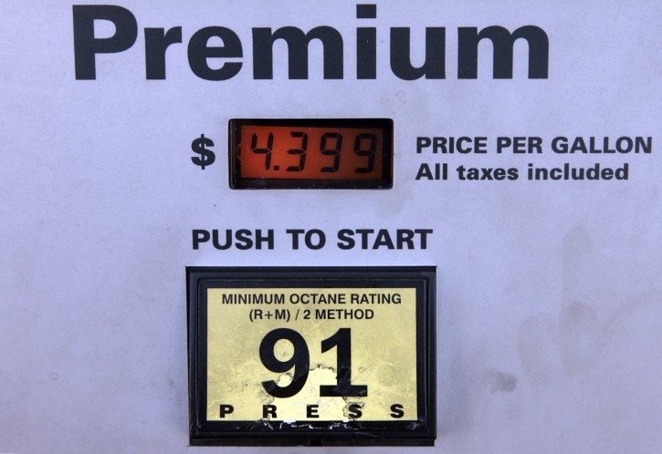 The Full Service price per gallon of Premium gasoline is displayed at a pump at a gas station in Berverly Hills, Calif., Friday, Jan. 18, 2008. Historic oil prices and $3-a-gallon gasoline have been contributing to fears of a recession, but they've yet to cause the hue and cry that some might expect. Americans may simply be growing more accustomed to high fuel costs, analysts say. (AP Photo/Damian Dovarganes)