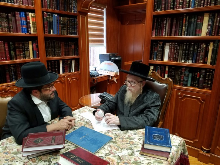 Rabbi Yechiel Steinmetz Dyan of Square analyzing the bulb with Morty Kohn