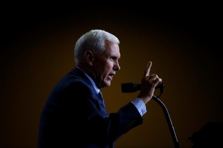 Republican vice presidential nominee Mike Pence speaks at a campaign rally in Phoenix, Arizona, U.S., August 31, 2016.   REUTERS/Carlo Allegri   