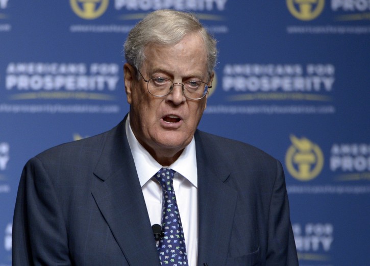 FILE - In this Aug. 30, 2013 file photo, David Koch speaks in Orlando, Fla. The Republican door-knockers are busy selling Pennsylvania Sen. Pat Toomey, and they never mention Donald Trump. Such is the 2016 landscape in battleground across the country, where hundreds of activists tied to the billionaire Koch brothers are eschewing the top of the ticket in favor of protecting the Republican majority in the Senate.  (AP Photo/Phelan M. Ebenhack, File)