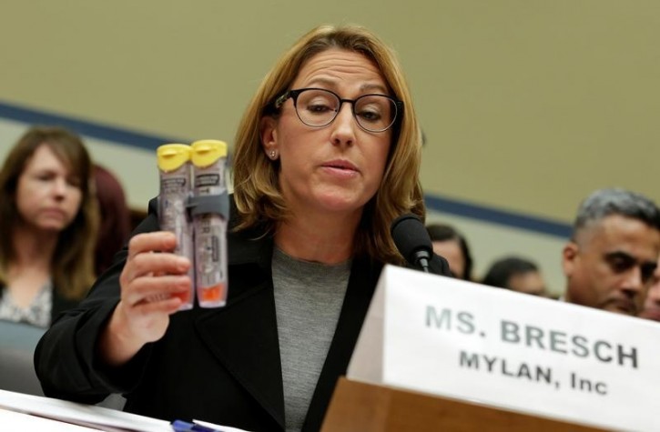 Mylan NL CEO Heather Bresch holds EpiPens during a House Oversight and Government Reform Committee hearing on the Rising Price of EpiPens at the Capitol in Washington, U.S., September 21, 2016. REUTERS/Yuri Gripas 