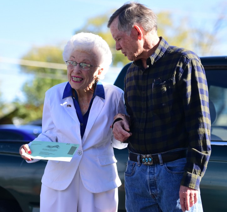 Jerry Emmett, who was born before women won the right to vote in the U.S., leaves the Yavapai County Administration Building with her son Jim, after casting her early ballot in the 2016 presidential election Tuesday, Nov. 1, 2016, in Prescott, Ariz. Emmett, who is 102 years old, voted for Franklin Delano Roosevelt in her first Presidential election. "I am getting to vote for Hillary Clinton for president which has been my dream since Bill Clinton was President." Emmett said. (Les Stukenberg/The Daily Courier via AP)