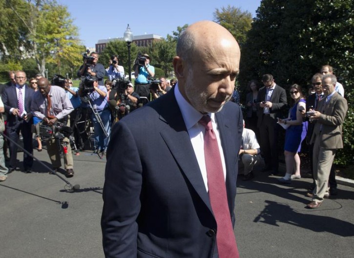 FILE - Lloyd Blankfein, Chairman and CEO of The Goldman Sachs Group walks away from the press after briefing them about his meeting between the Financial Services Forum and U.S. President Barack Obama at the White House in Washington, October 2, 2013.    REUTERS/Jason Reed   