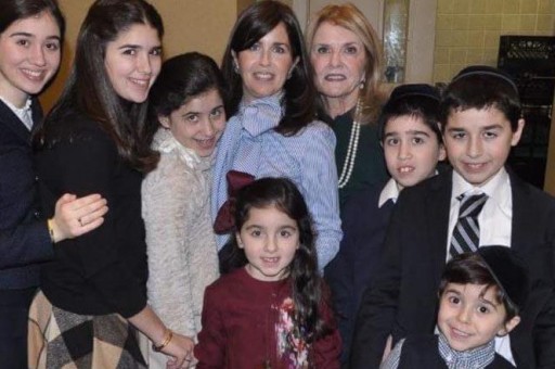 Gayle Sassoon (center, with her childern's grandmother to her right) and her children.
