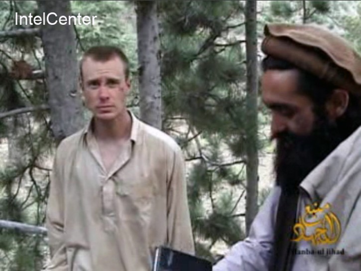 Bowe Bergdahl FILE - This file image provided by IntelCenter on Dec. 8, 2010, shows a frame grab from a video released by the Taliban containing footage of a man believed to be Bowe Bergdahl, left. Saturday, May 31, 2014, U.S. officials say Bergdahl, the only American soldier held prisoner in Afghanistan has been freed and is in U.S. custody. The officials say his release was part of a negotiation that includes the release of five Afghan detainees held in the U.S. prison at Guantanamo Bay, Cuba. (AP Photo/IntelCenter, File)