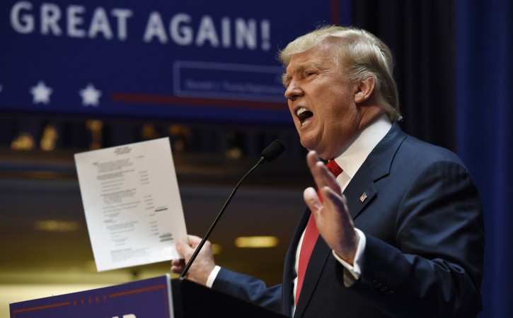 Donald Trump Announces Candidacy to be President of the United States US businessman Donald Trump holds a piece of paper with information about his personal finances while announcing that he is running to be president of the United States, during an event at Trump Tower in New York, New York, USA, 16 June 2015. EPA