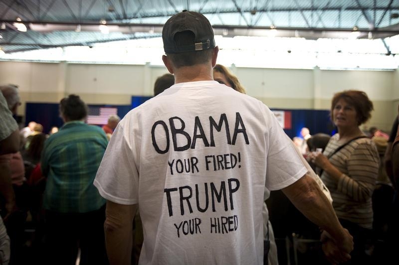 FILE - A supporter of Republican presidential candidate Donald Trump gathers before the 