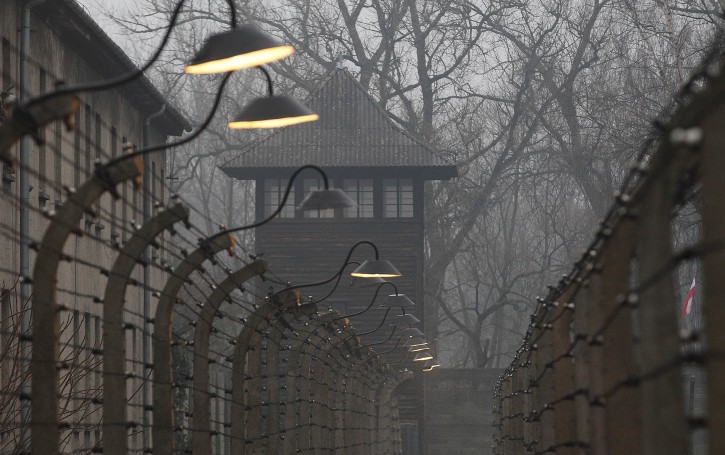 Barbed wire fences are pictured at the former Nazi German concentration and extermination camp Auschwitz on the International Holocaust Remembrance Day in Oswiecim, Poland, Saturday, Jan. 27, 2018. AP Photo/Czarek Sokolowski)