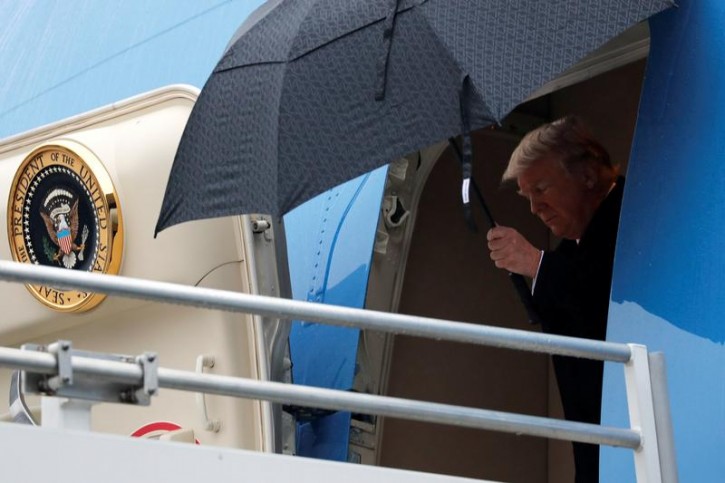 FILE - U.S. President Donald Trump arrives aboard Air Force One at Nashville International Airport in Nashville, Tennessee, U.S. January 8, 2018. REUTERS/Jonathan Ernst