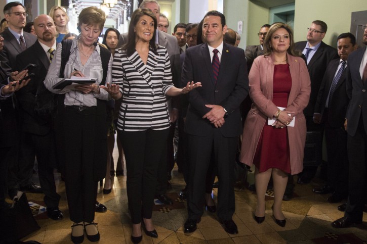 Nikki Haley, U.S. ambassador to the U.N., left, gives a statement to the press, alongside Guatemala's President Jimmy Morales after their meeting at the National Palace of Culture in Guatemala City, Wednesday, Feb. 28, 2018.  (AP Photo/Luis Soto)