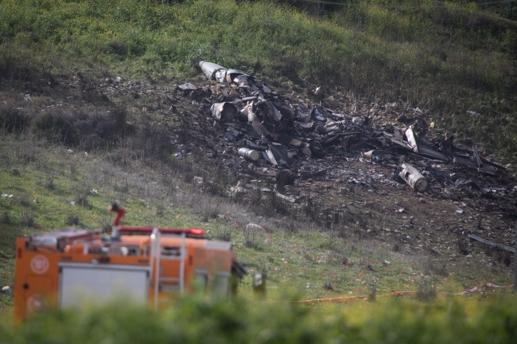 View of the remains of an F-16 plane crashed early this morning near the Israeli town of Harduf in northern Israel, on February 10, 2018. Israeli Air Force F-16 jets were sent to Syria following an invasion of an Iranian drone. Syrian forces fired missiles forcing the pilots of on F-16 to eject themselves. Photo by Hadas Parush/Flash90