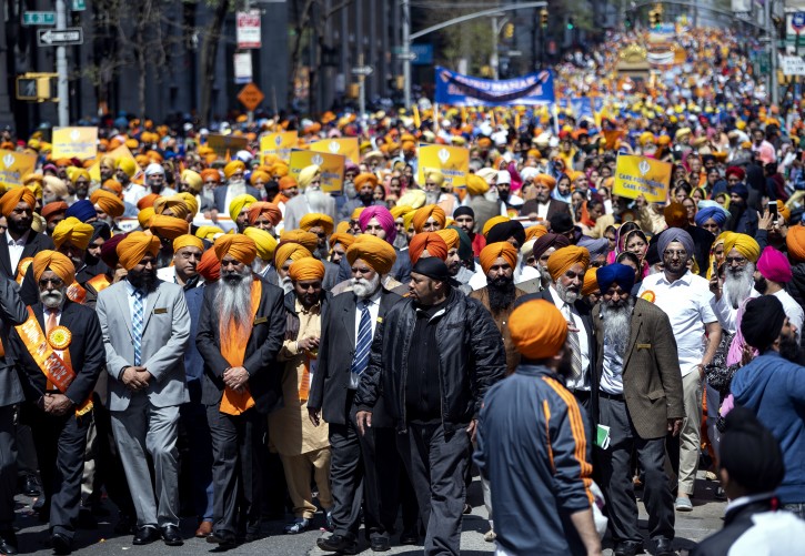 Participants fill Madison Ave. during the Sikh Day Parade, an annual Nagar Keertan "meditation celebration" Saturday, April 28, 2018, in New York. (AP Photo/Craig Ruttle)