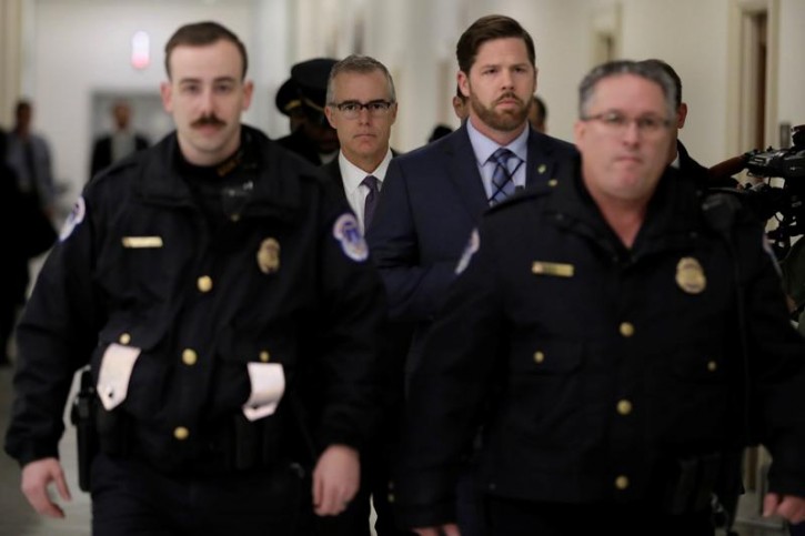 FBI Deputy Director Andrew McCabe (C) arrives to testify behind closed doors before the House Judiciary Committee on Capitol Hill in Washington, U.S., December 21, 2017. REUTERS/Yuri Gripas